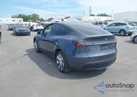 2023 Tesla Model Y Awd/Long Range Dual Motor All-Wheel Drive z USA, uszkodzony, nr VIN 7SAYGDEE8PF786011